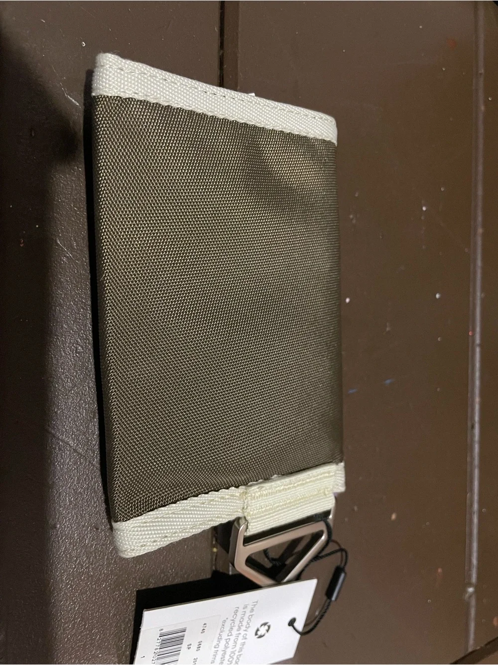 Calvin Klein Brown Tri-Fold Wallet with Cream Trim.
